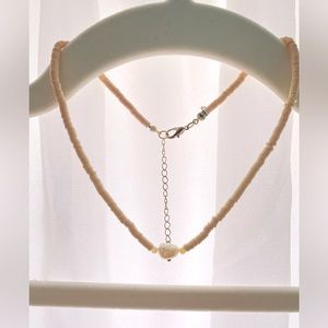 Pearl necklace with clay beads